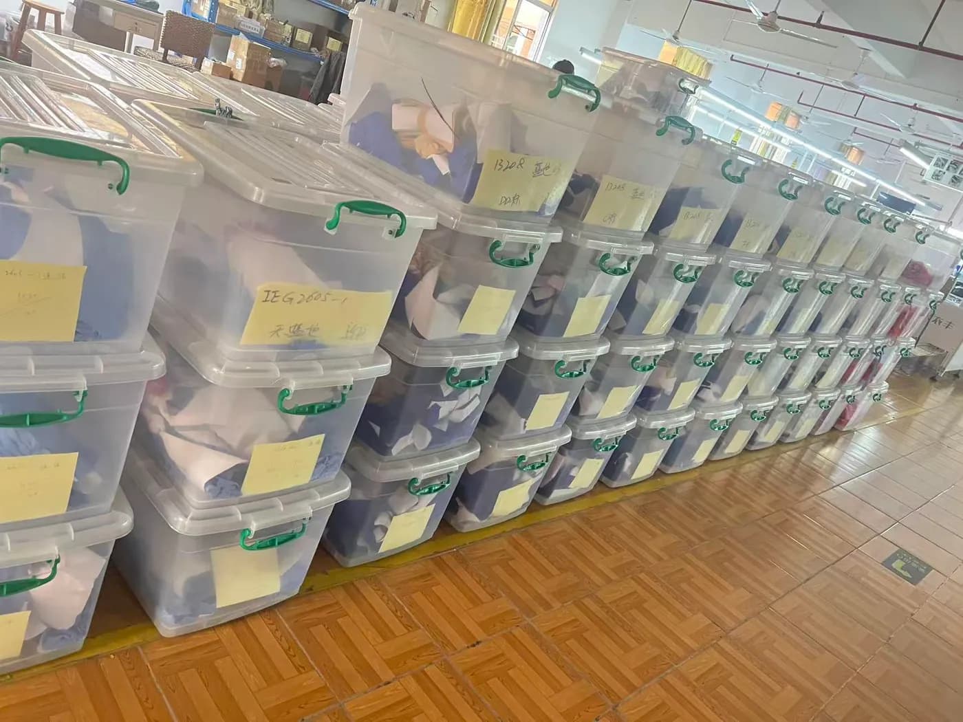 Fabric warehouse with rolls of swimwear and activewear fabric