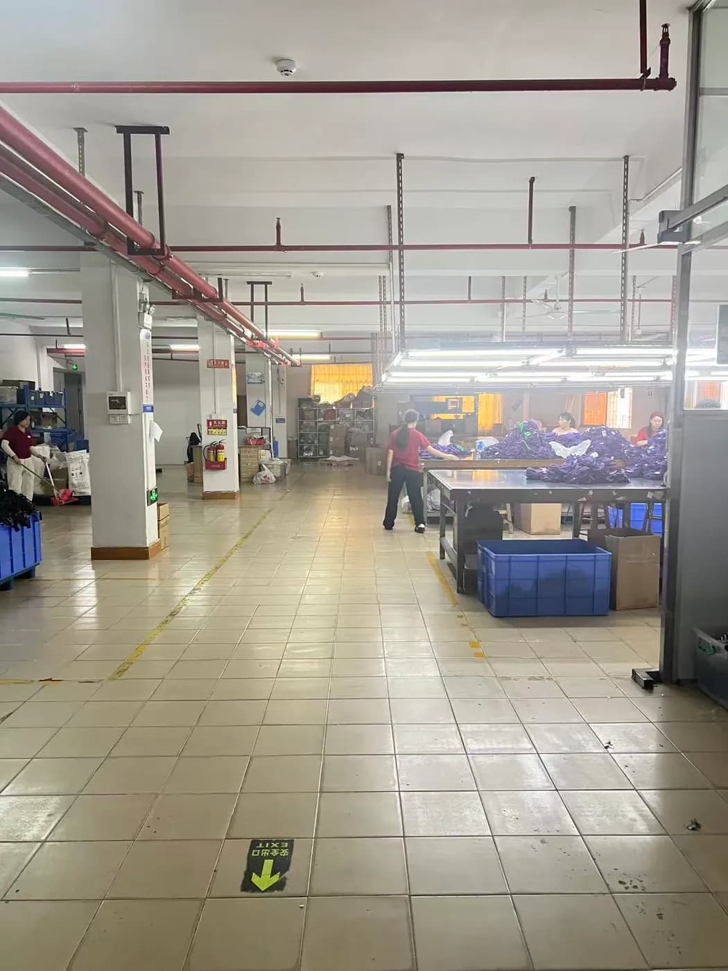 Clean, organized factory workshop aisle