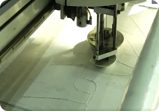 Automatic fabric cutting machine for swimwear patterns